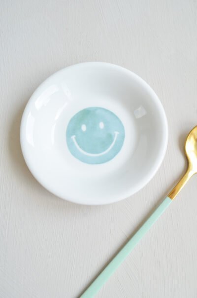 mini schaaltje met smiley illustratie in aqua blauw